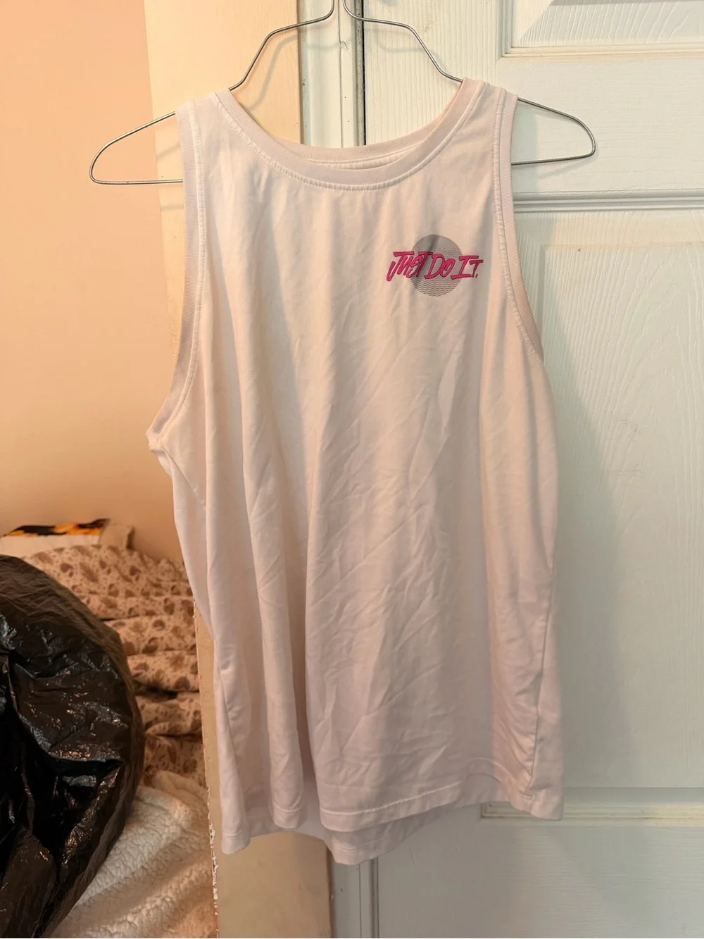 Nike Women’s Light Pink Athletic Tank with 'Just Do It' Graphic